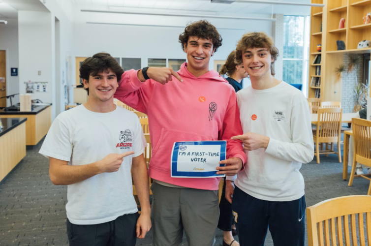 Enthusiastic students Ben Amato ‘25, Jax Julkowski ‘25, and Ben Moga ‘25 express their excitement for the opportunity to vote
